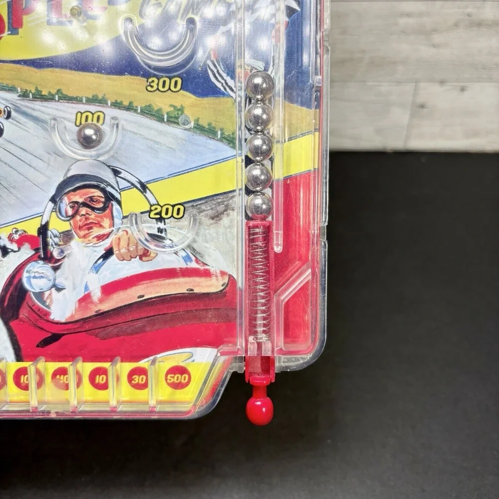 2007 Schylling 500 Mile Speedway Hand Held Pinball Game‎